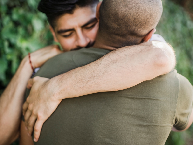 Men sharing a hug