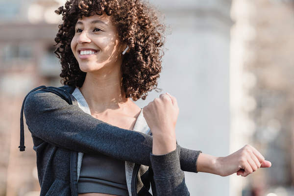 Person stretching before working out to help with sleep